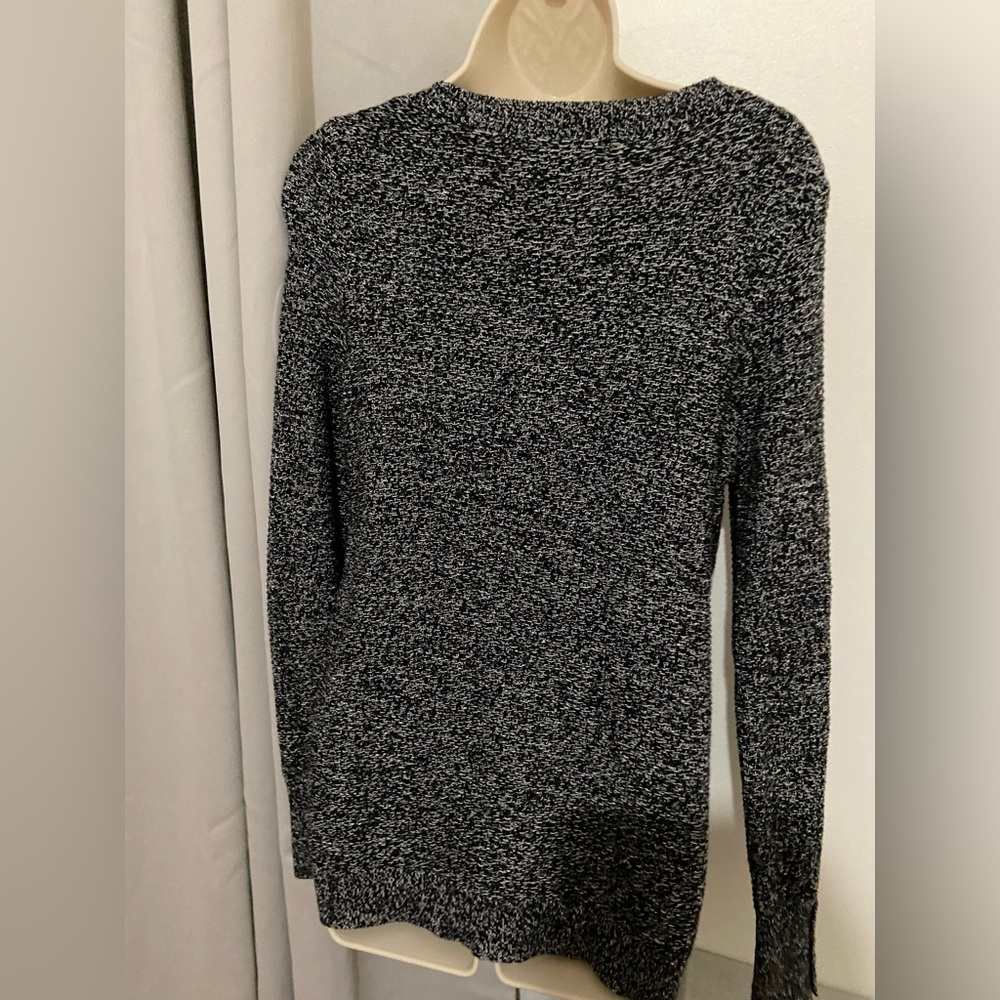 Black sweater from loft brand new never worn before. Woven.